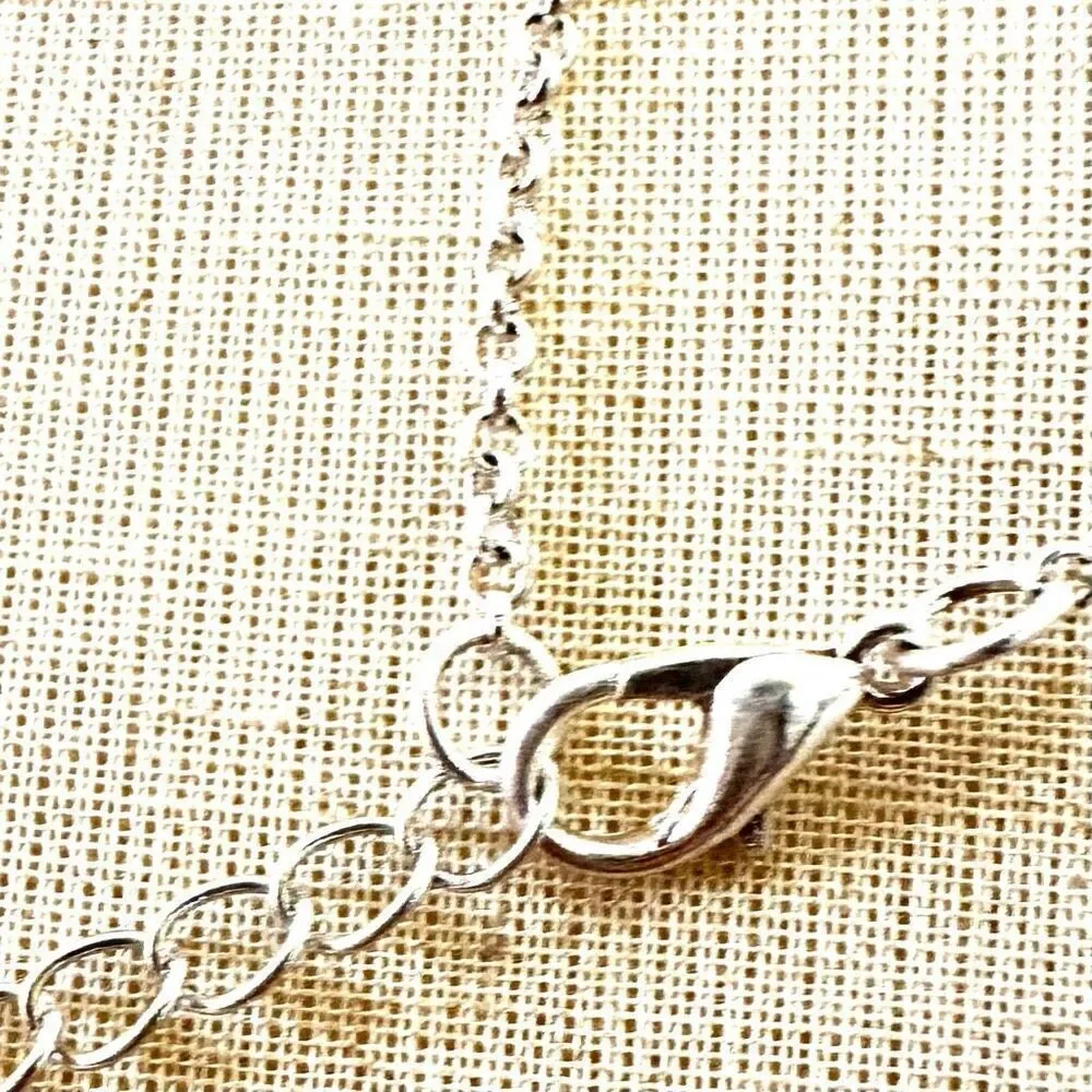 Silver tone long tassel necklace